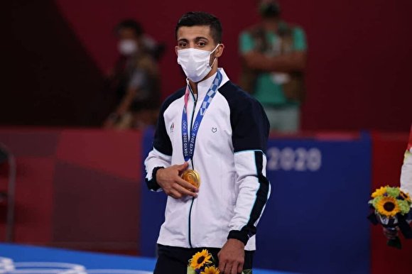 عکس/ مدال طلای المپیک بر گردن محمدرضا گرایی