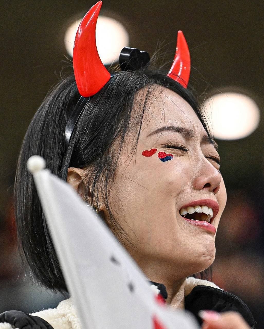 عکس/ گریه پربیننده هوادار تیم شکست خورده کره جنوبی