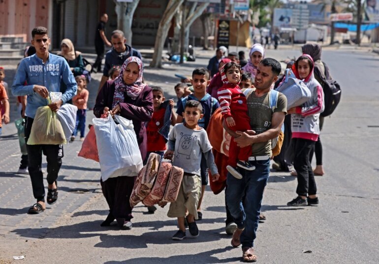هجوم مردم غزه به انبارهای مواد غذایی سازمان ملل