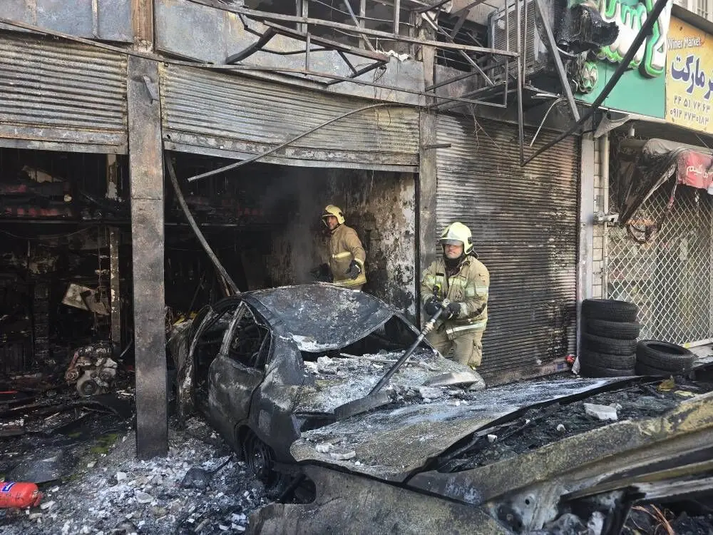 آتش سوزی یک مکانیکی در تهران