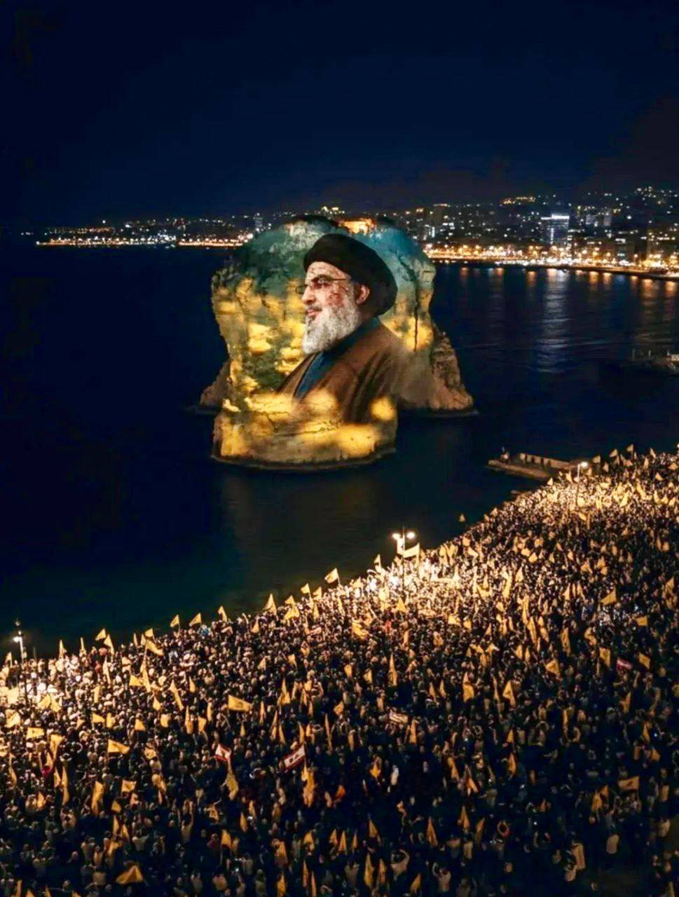 ساخت تصویر سید حسن نصرالله با نور بر روی یک صخره خاص