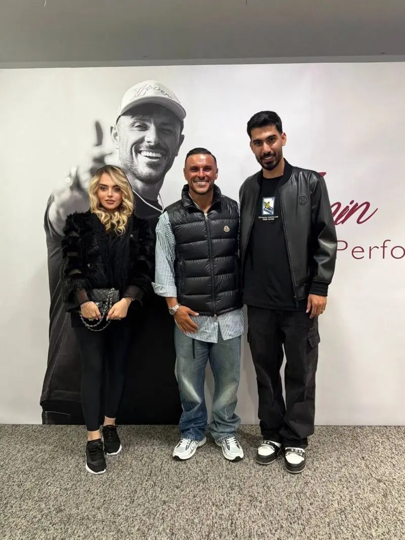 رضا شکاری و همسرش