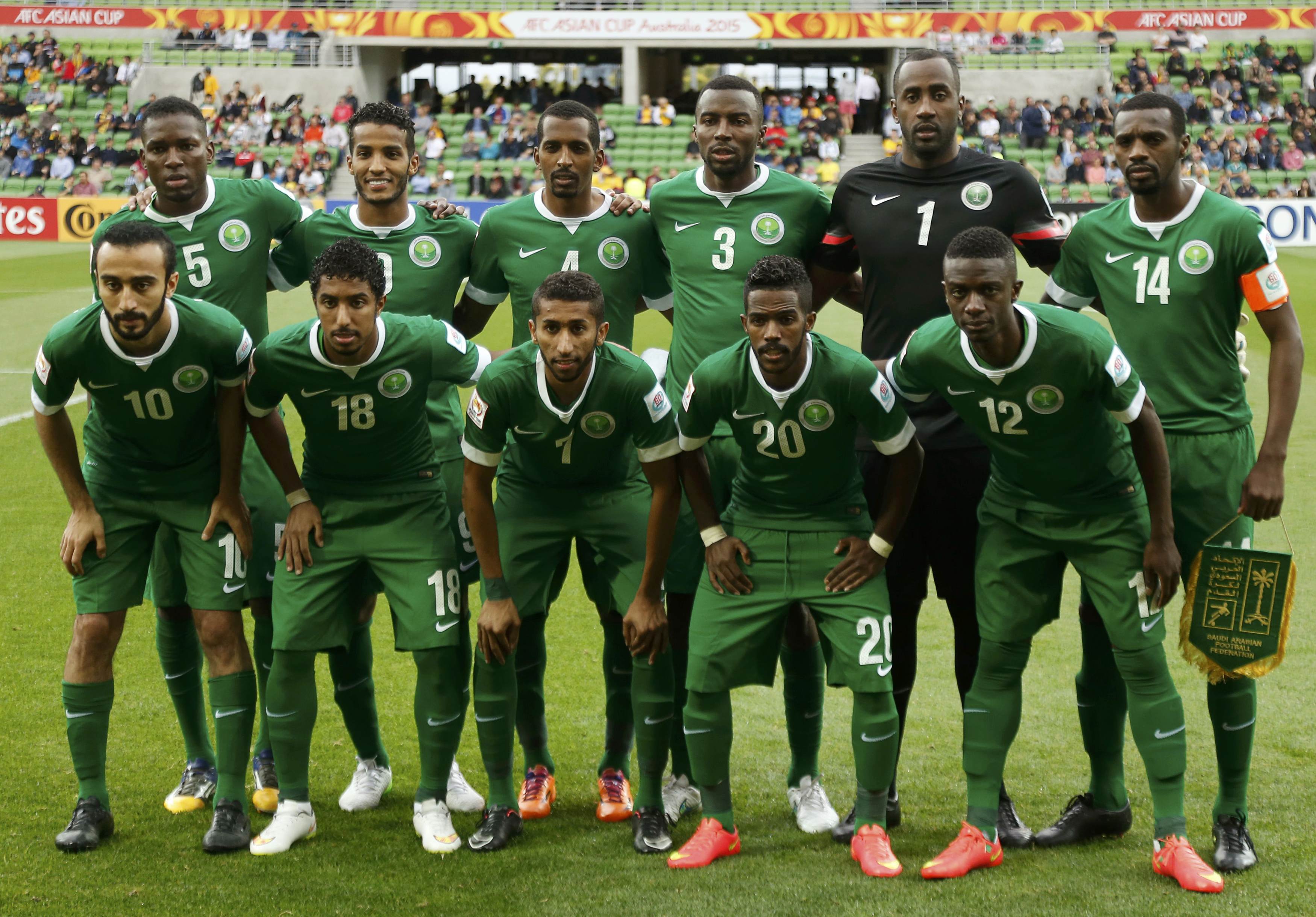 The Saudi Arabia team poses for a photo before their Asian Cup Group B soccer match against against North Korea at the Rectangular stadium in Melbourne